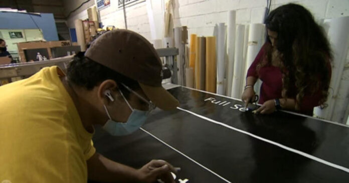 sign-company-leads-way-in-hiring-women