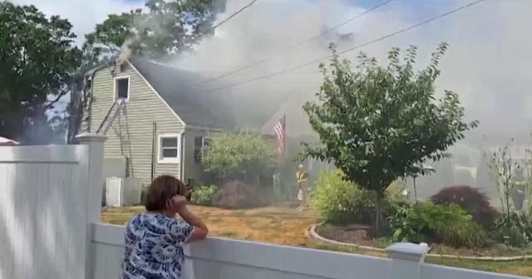 firefighters-rescue-woman,-3-dogs-from-blaze